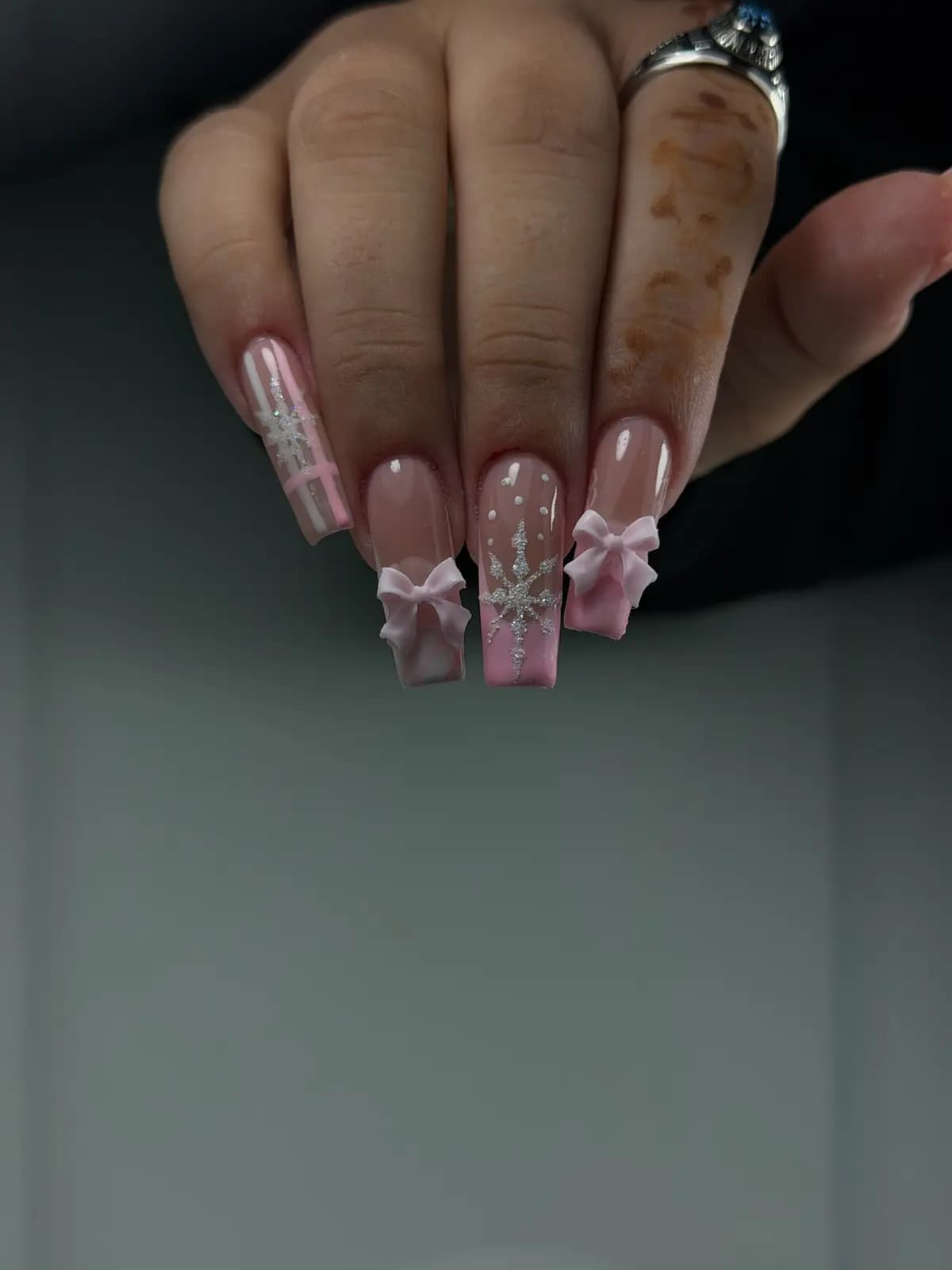 Pink coffin nails with 3D bows and glitter details