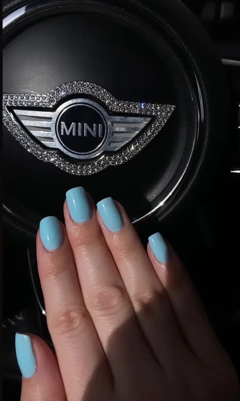 Sky blue gel manicure on medium-length square nails