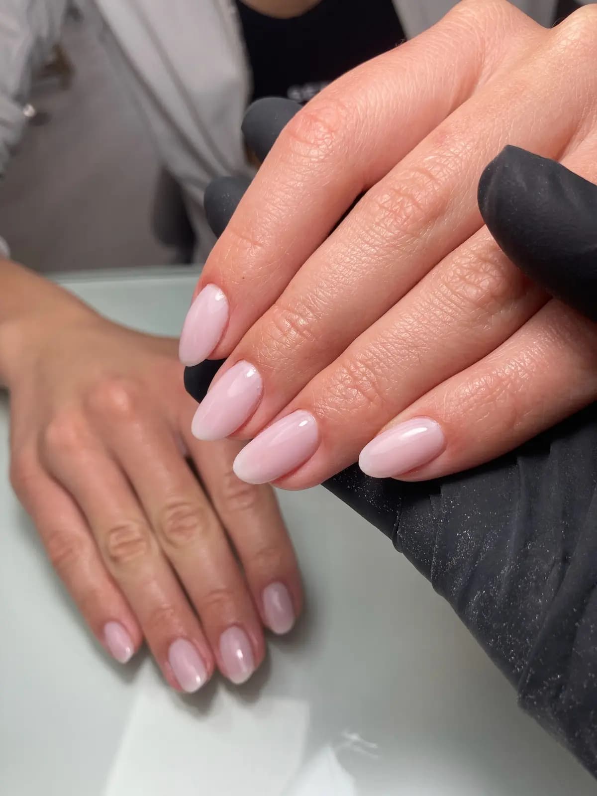 Dusty pink gel manicure on medium-length almond nails