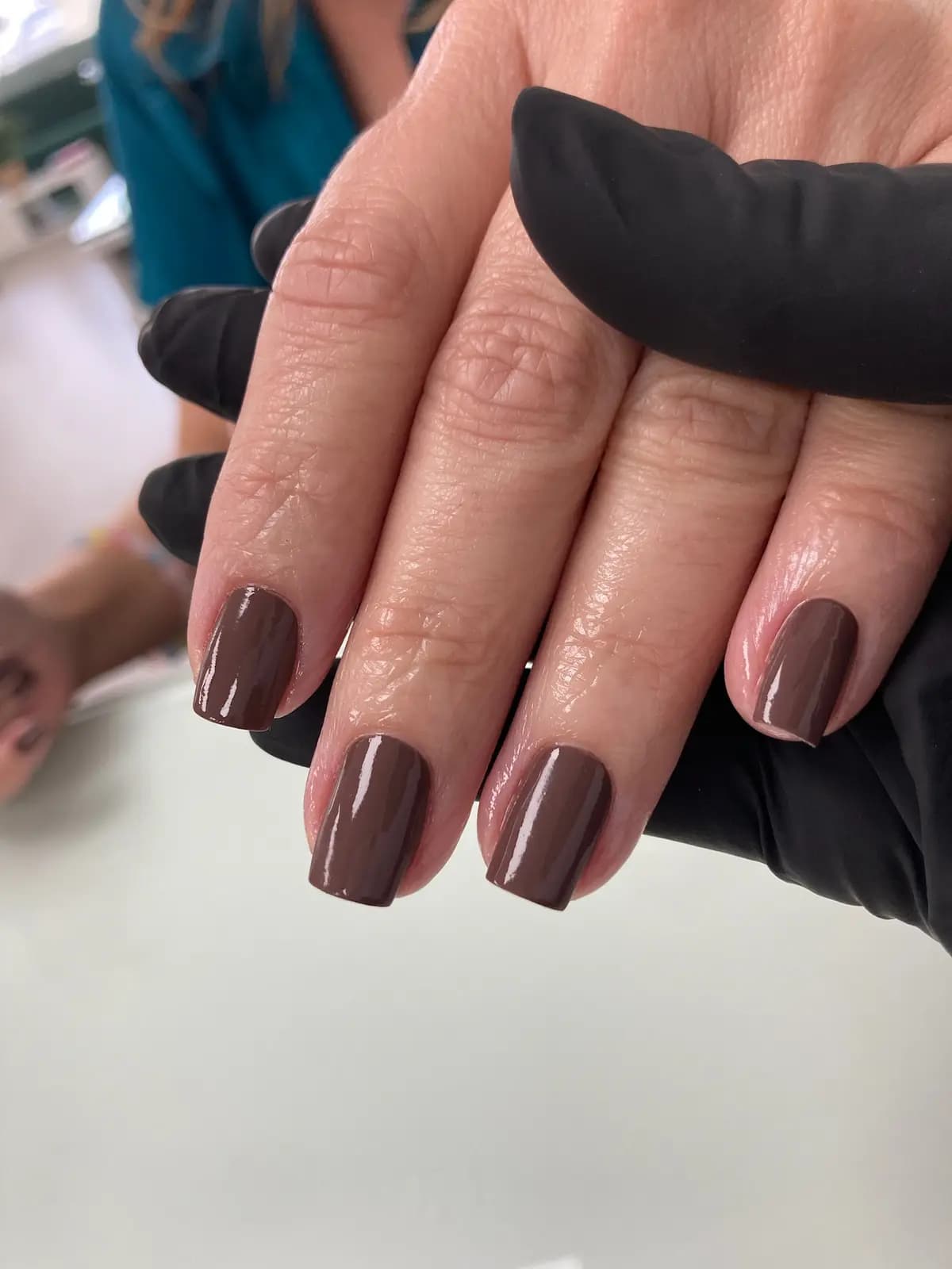 Short square nails in chocolate brown gel with high gloss