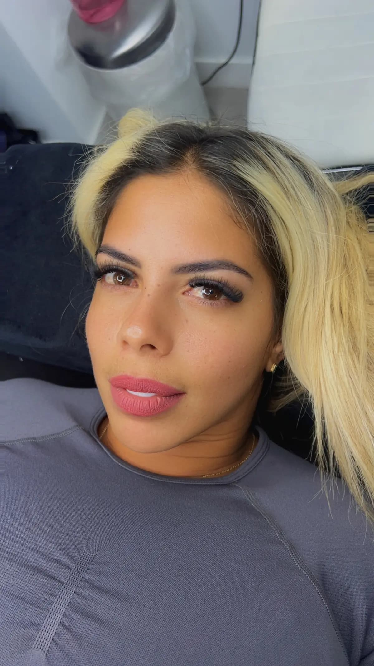 Blonde client with a volume set and defined brows