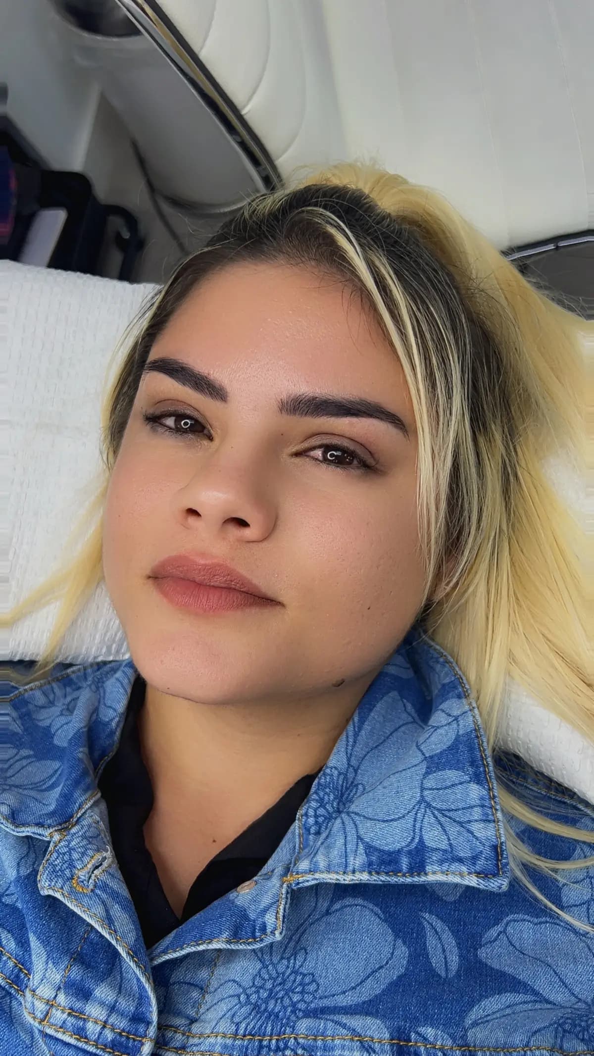 Client with defined brows, portrait at the finish