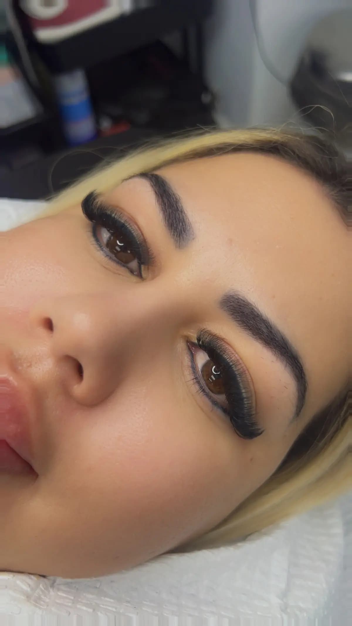 Shaped and tinted brow with a brushed-up finish