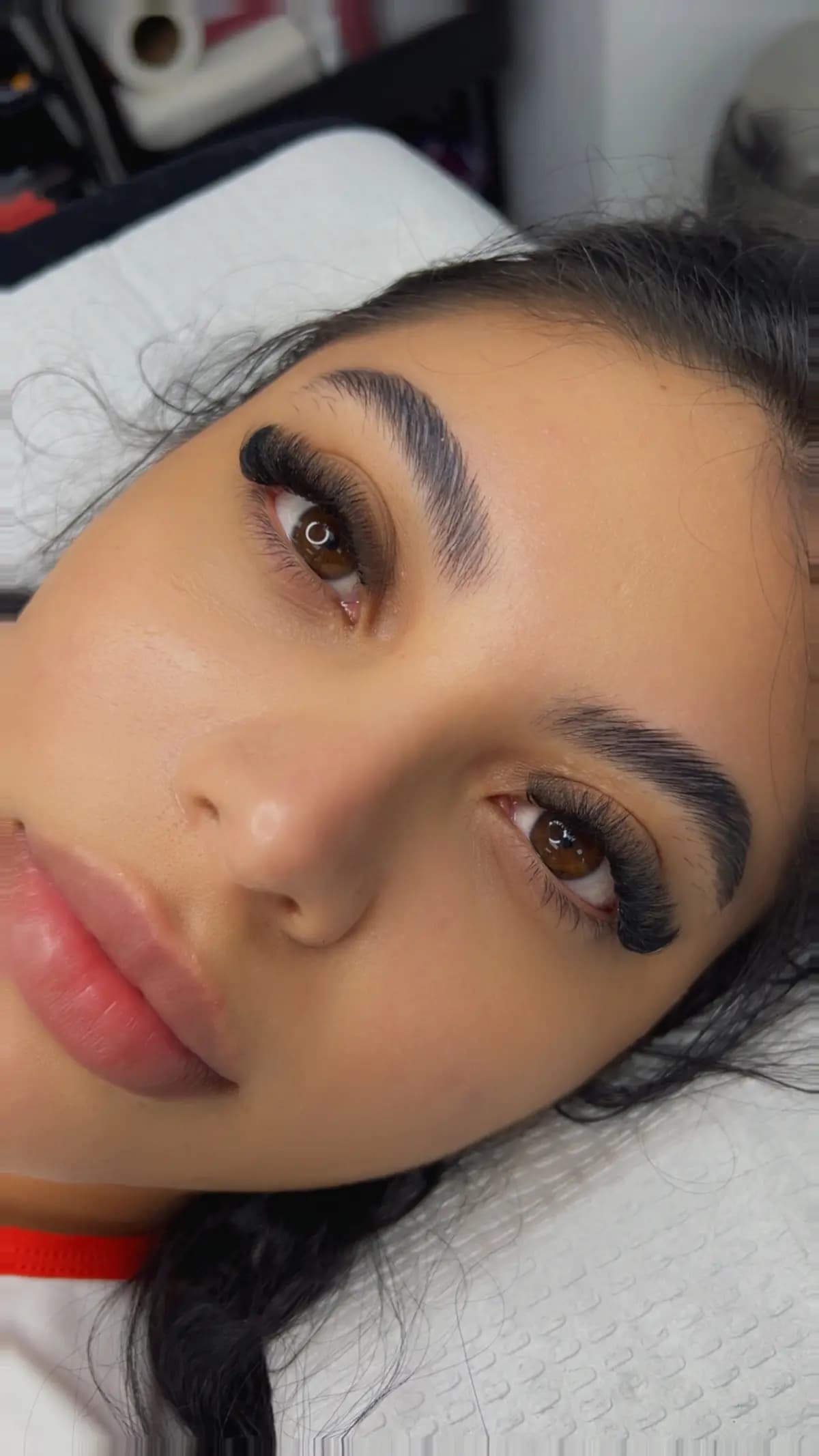 Symmetrical, defined brows alongside a lash set