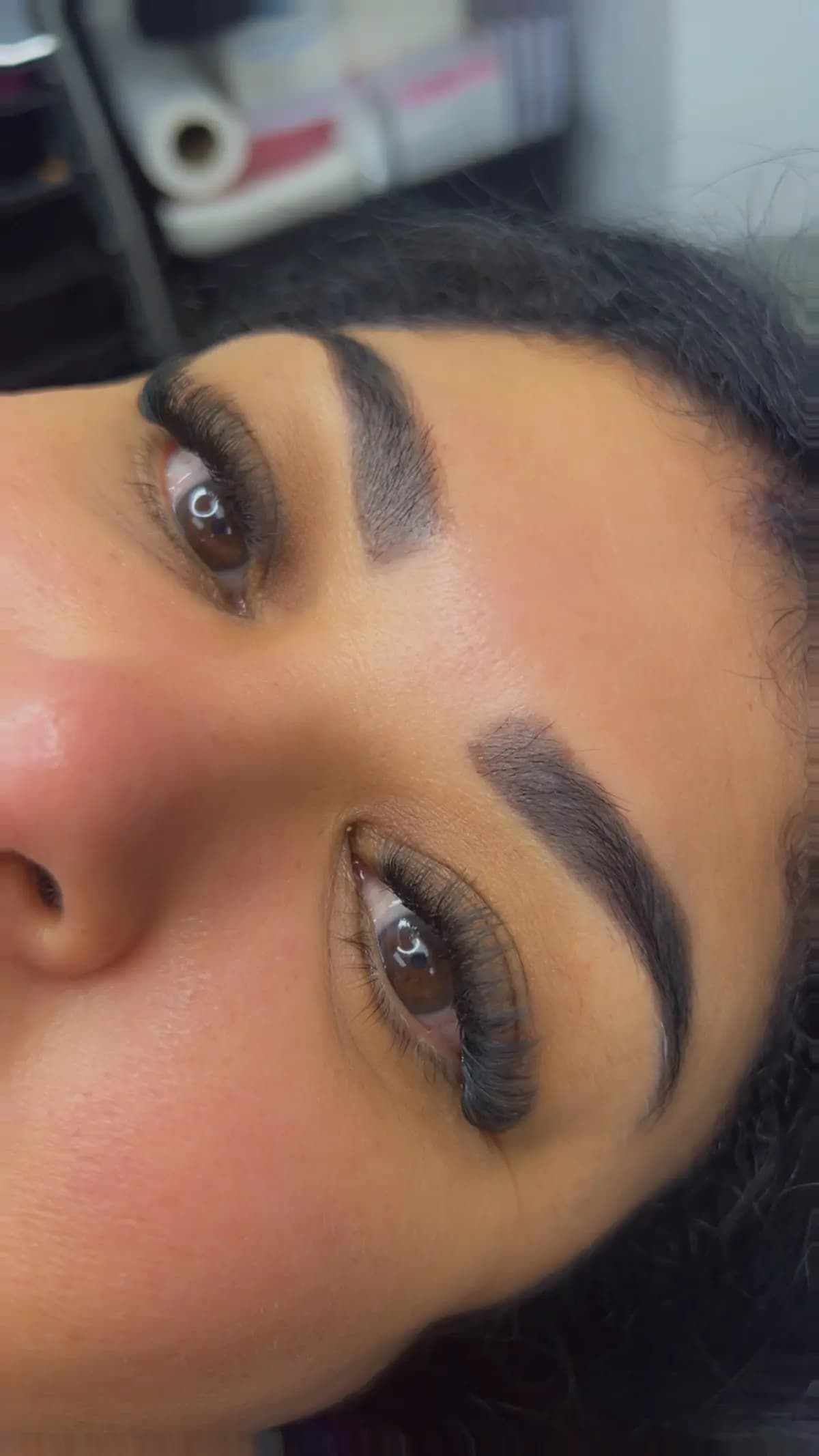 Defined brow with a sharp tail, close up