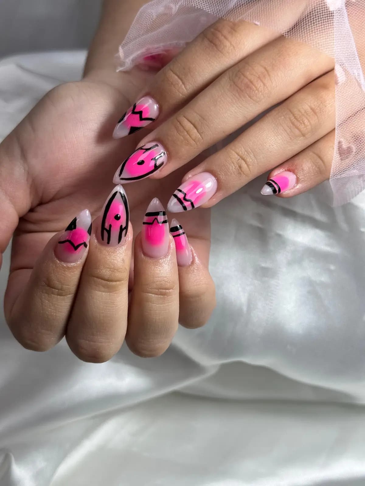 Long nails with hand-painted pink and black flames