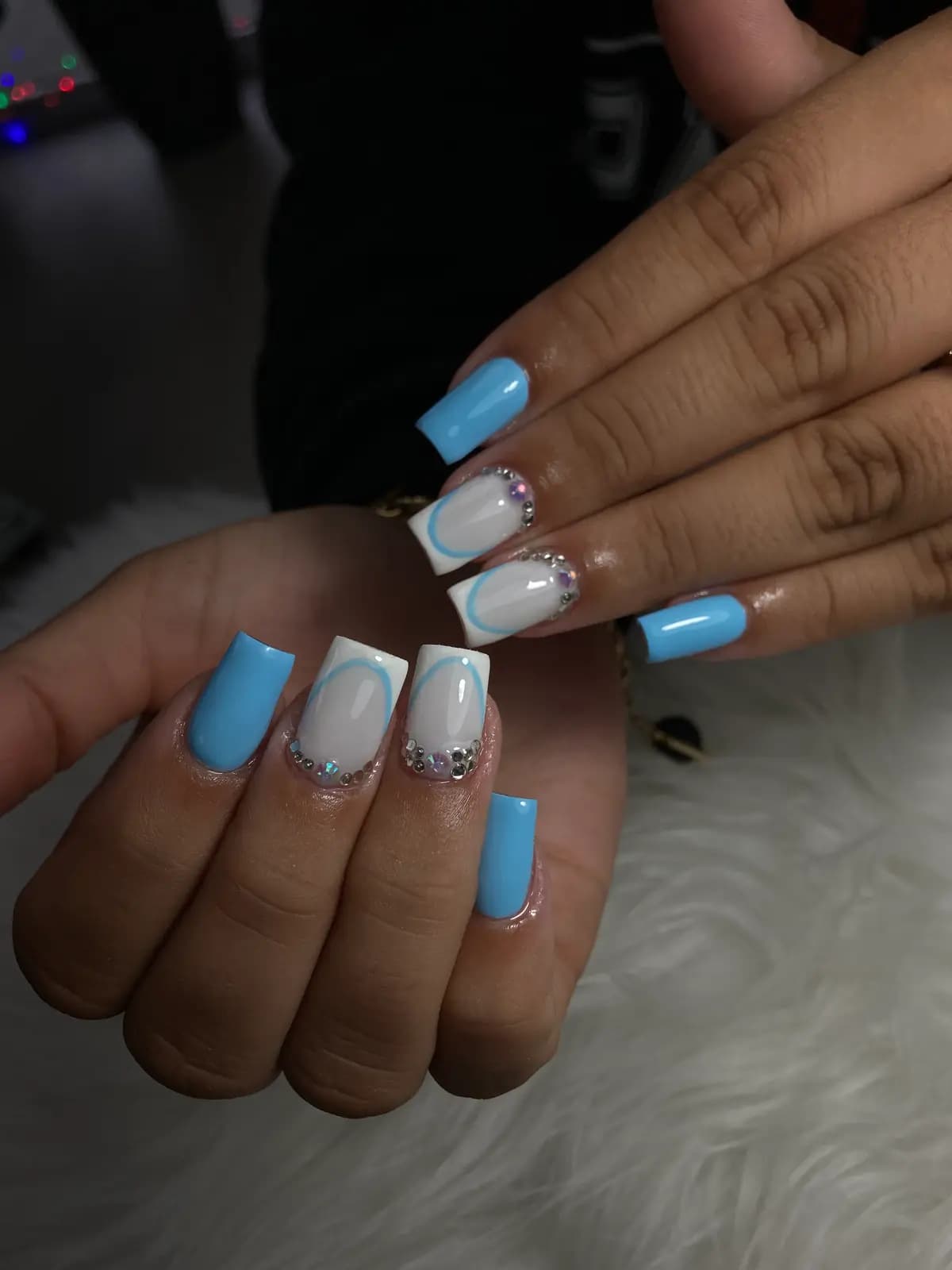 Blue and white french on long square nails with a glitter detail