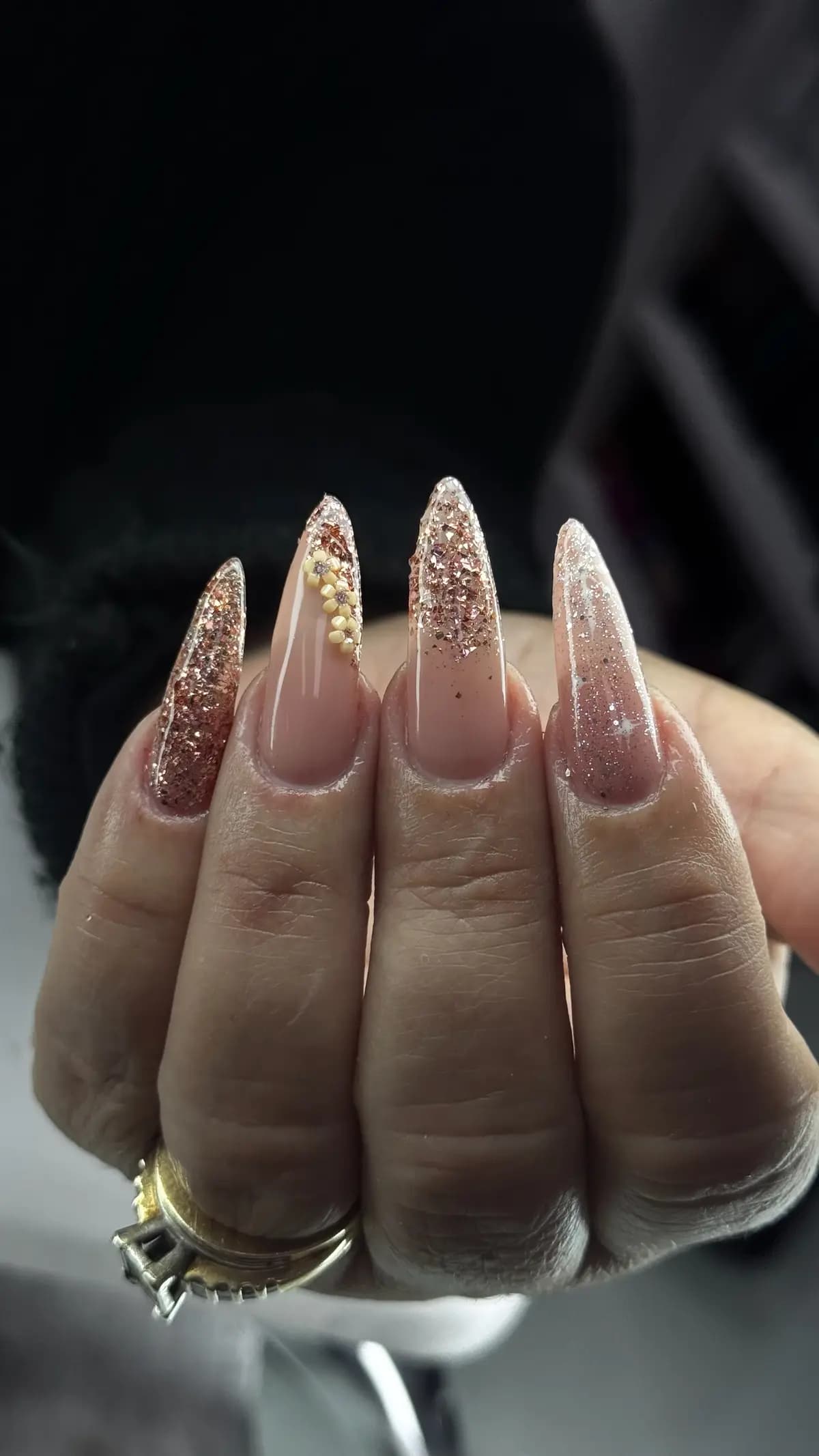 Long nails with a champagne glitter fade from base to tip