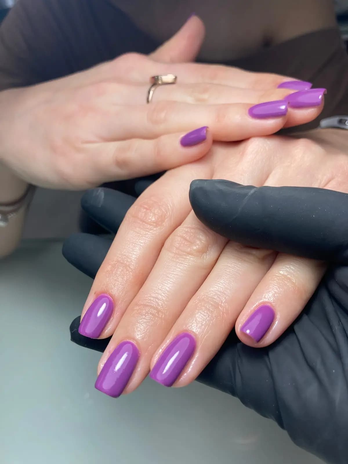 Violet gel manicure on square nails, freshly finished