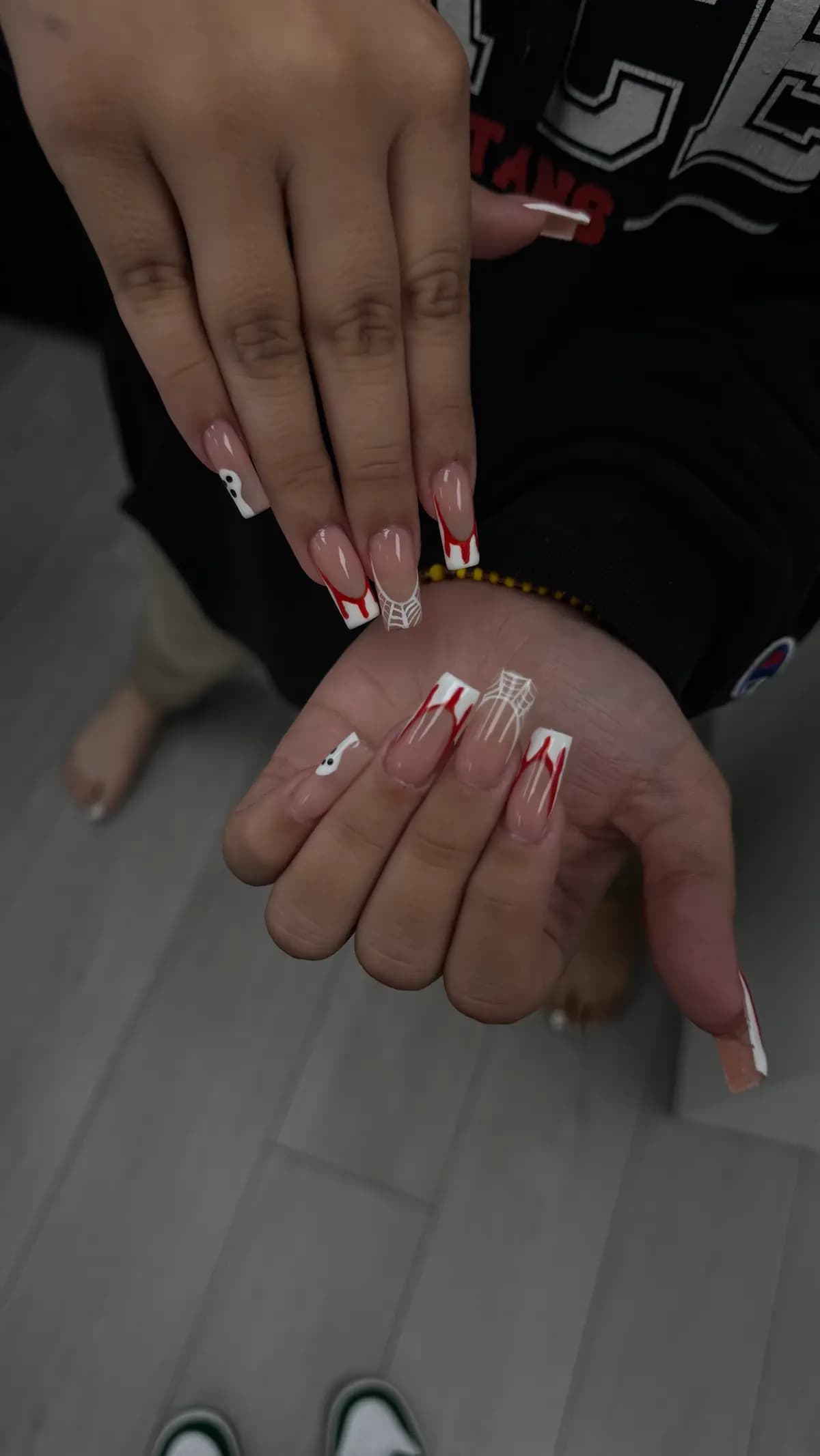Extra-long square nails with white french and silver charms