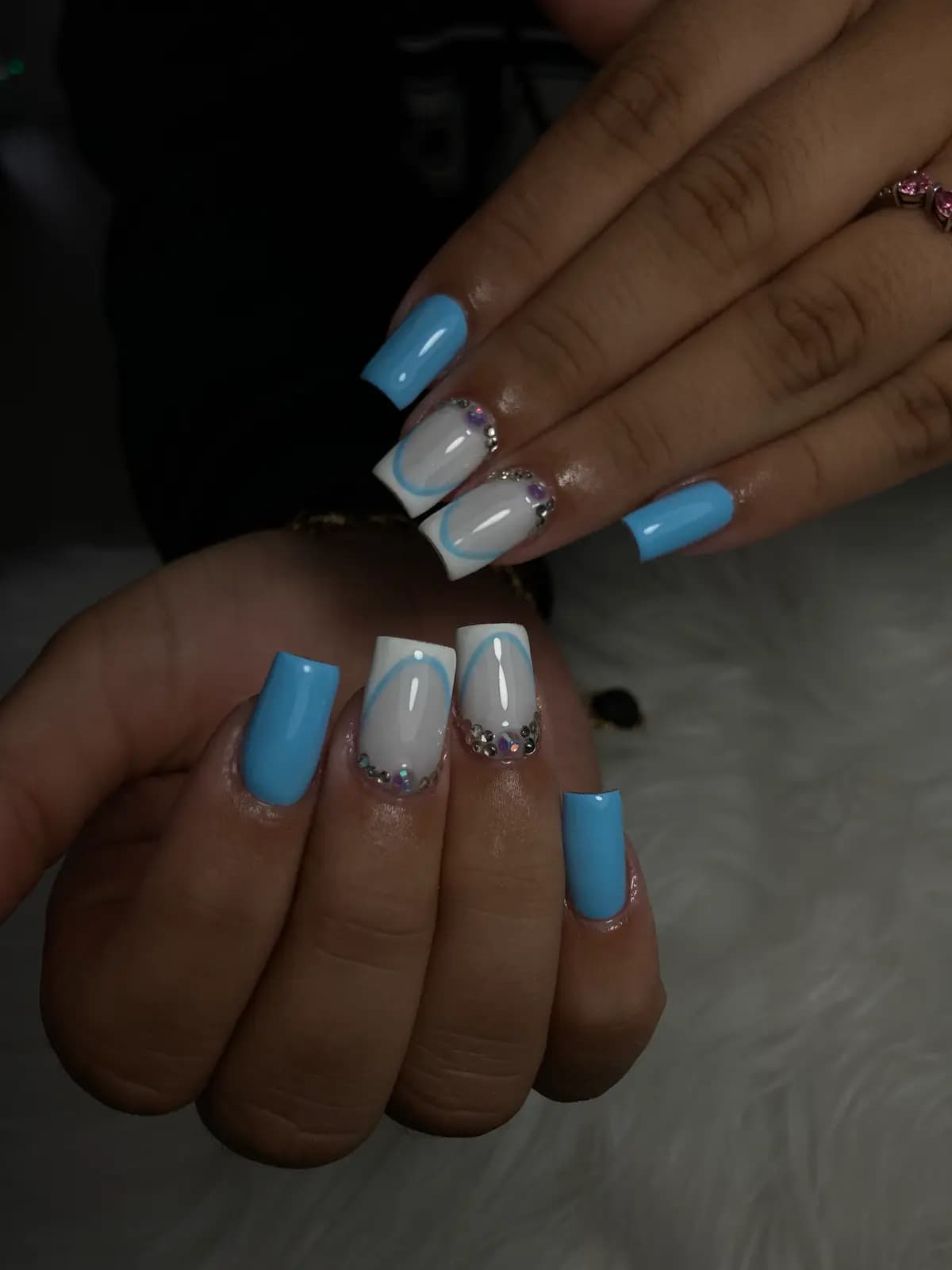 Blue and white french on long square nails, both hands