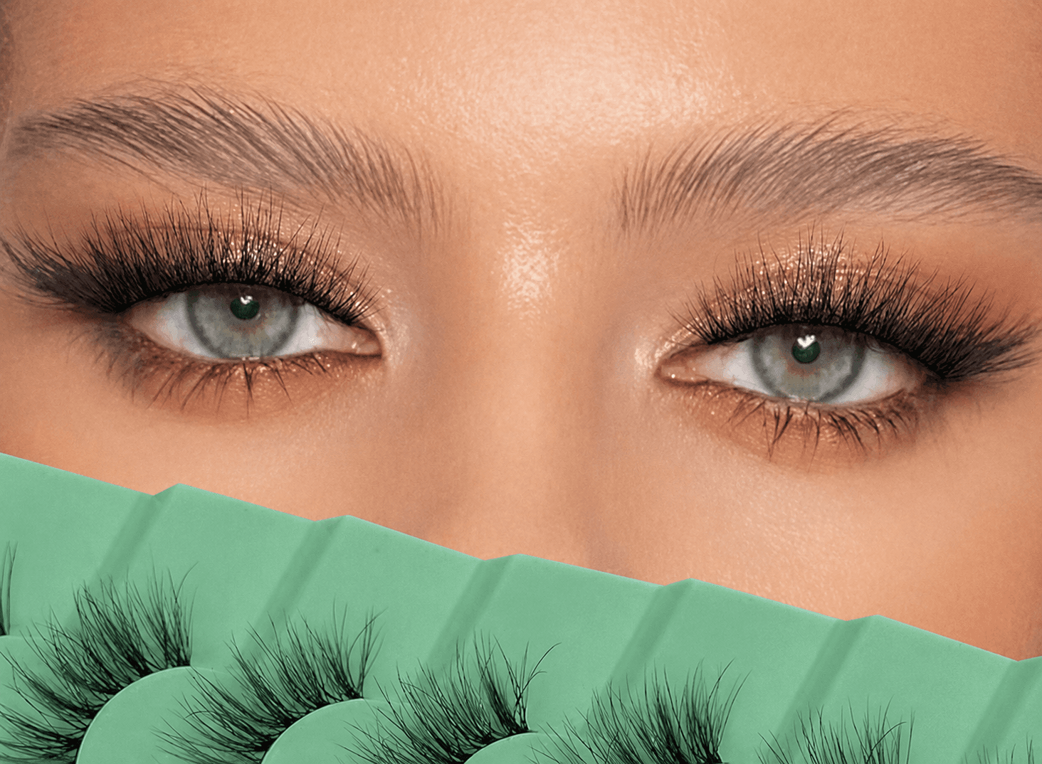 Eyes with volume eyelash extensions and a tray of fans — eyelash extensions in Hialeah, FL